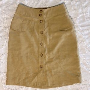 A New Day Size 4 Khaki colored button down skirt with pockets. Perfect condition